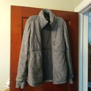 North face women's jacket grey with hood zipped hood inside.